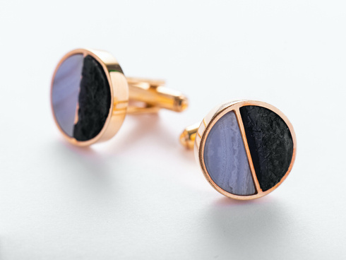 Gold plating cufflinks with coal chunks and semi - blue crown agage