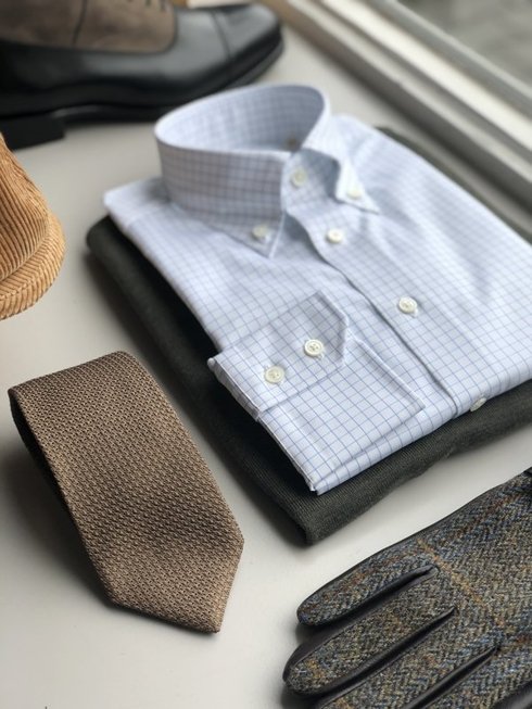 white button-down shirt with blue check